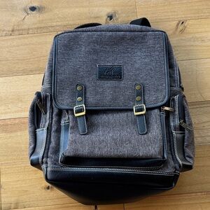 Just Fred’s Stylish Black and‎ Brown Backpack satchel